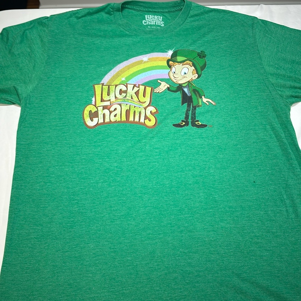 Men’s soft graphic tee, Lucky Charms, size XL. Minor hole in the front